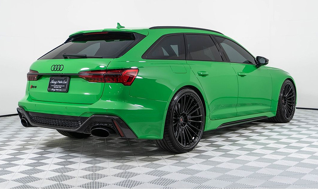 Green hatchback car in a 360Booth® photo studio