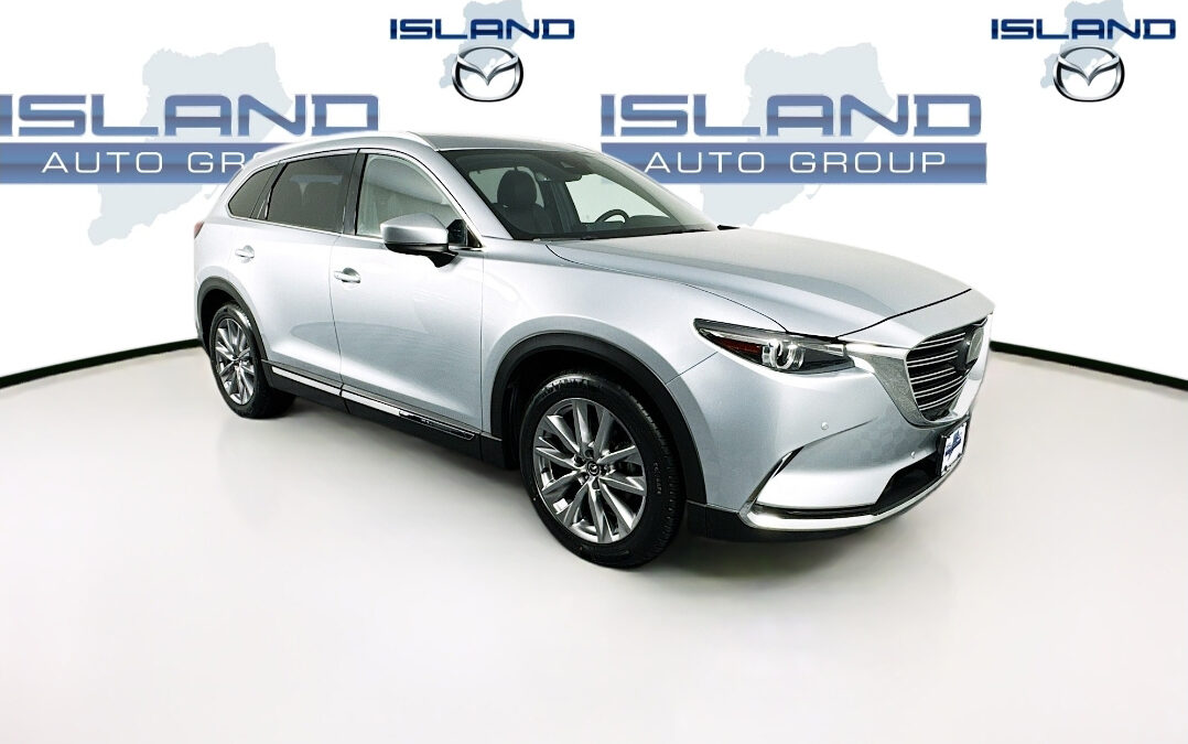 Car in a vehicle photo booth with brandling logos