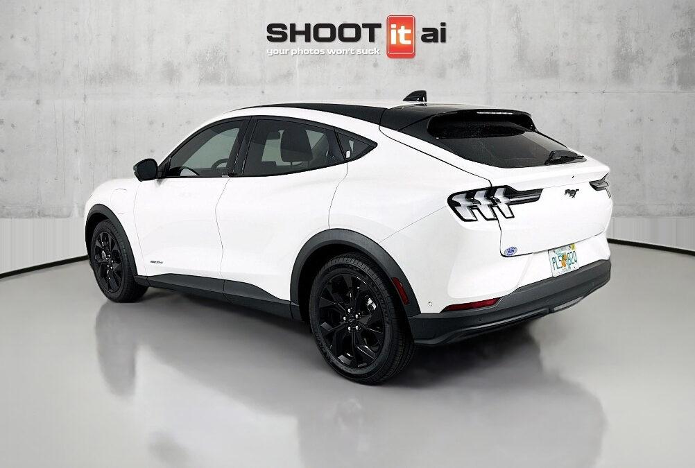 white SUV in a shootitai booth