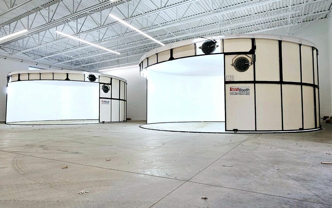 Two 360Booth automotive photo booths in a warehouse