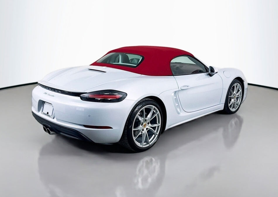 Red and white convertible in a car photo booth