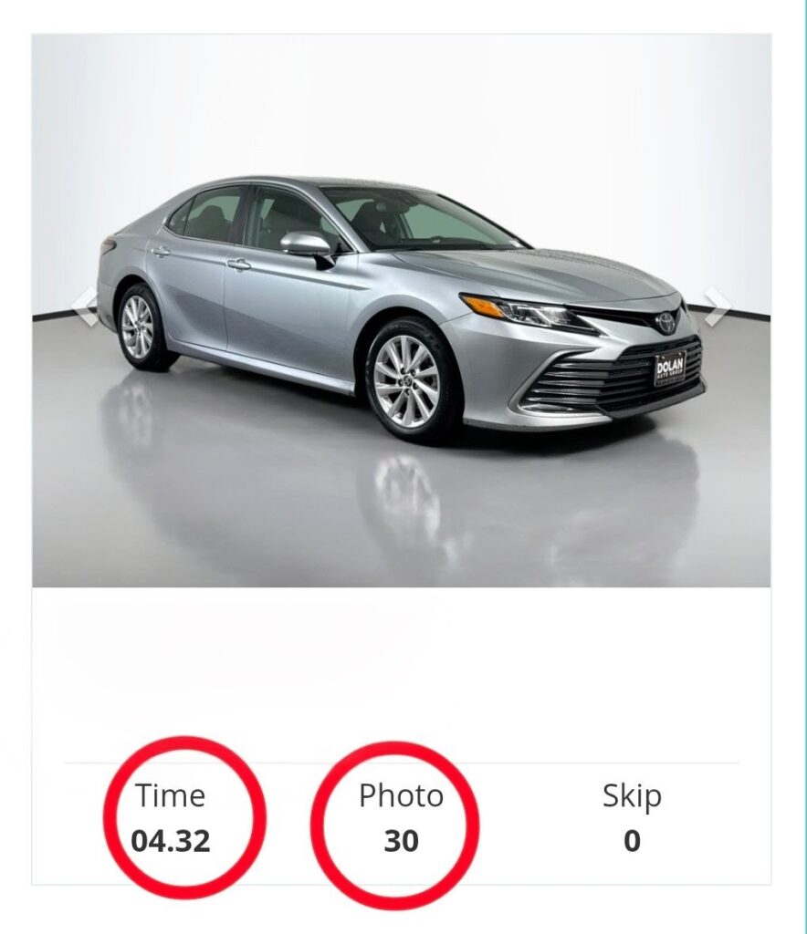 car in a car photo booth with workflow times displayed beneath it