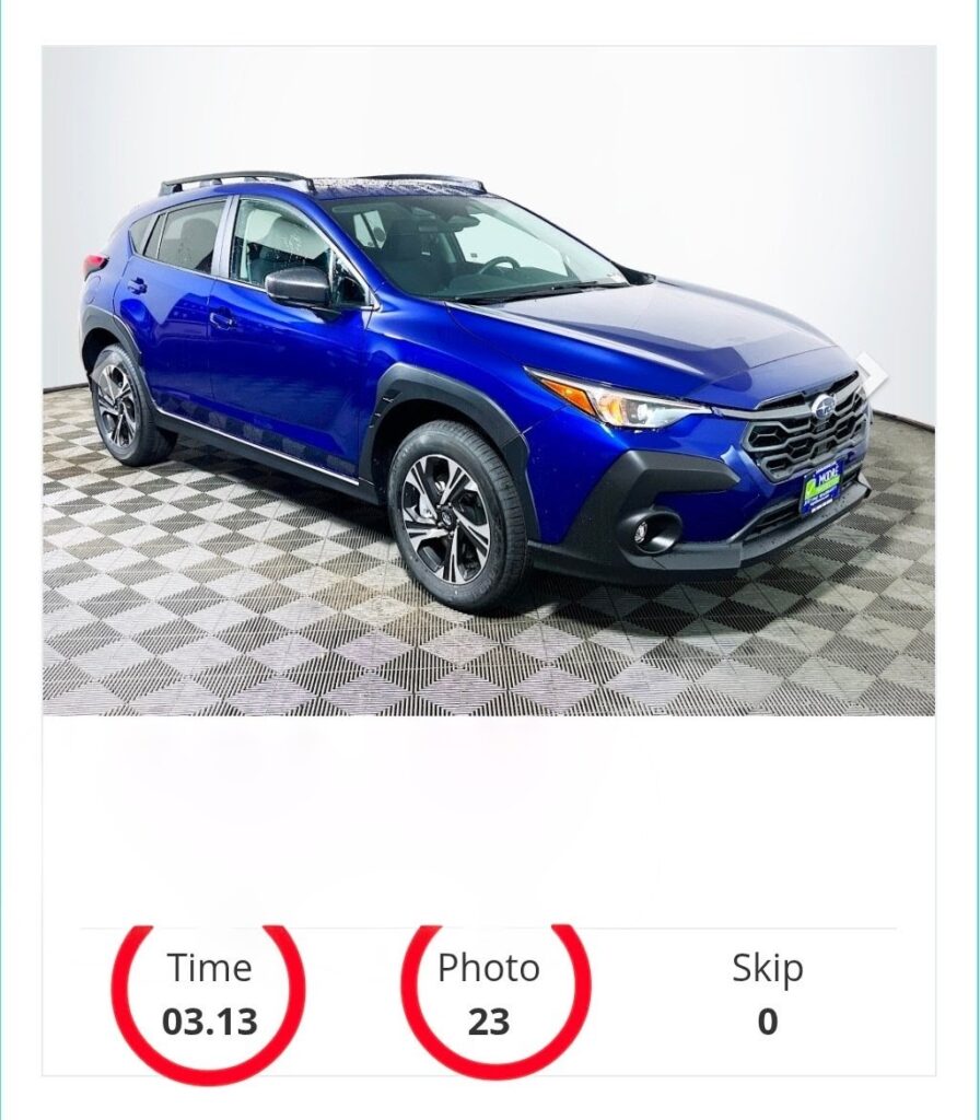SUV in an SUV photo booth with workflow times displayed beneath it