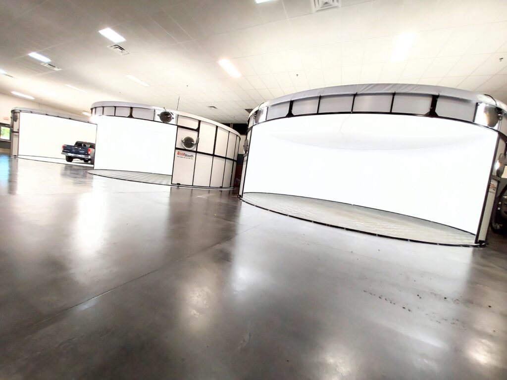 3 360Booth Vehicle Photo Studios in a dealership warehouse