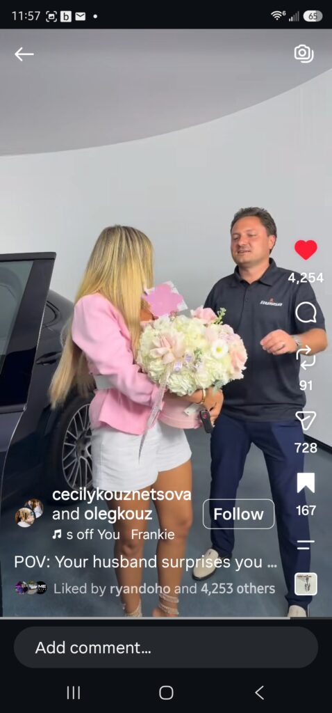 A woman holds a large bouquet of flowers given to her by her husband. The overlay reads, "POV your husband surprises you."