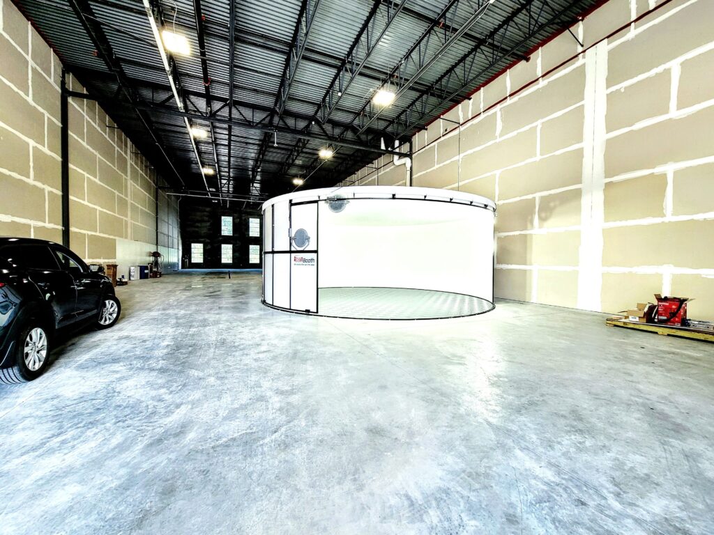 360Booth Vehicle Photo Studio in a dealership warehouse